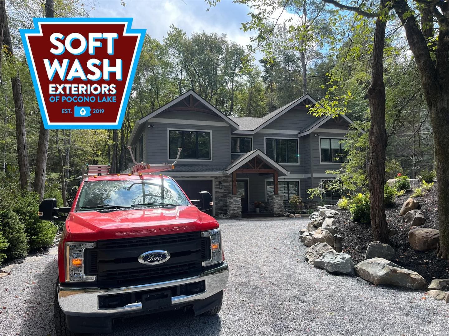 Craftsman home, wooded Pocono setting, red truck
